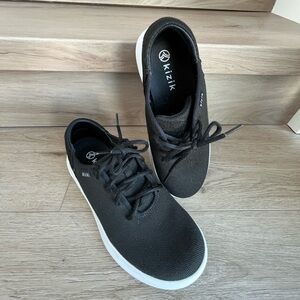 Women’s Kizik slip on athletic shoes.